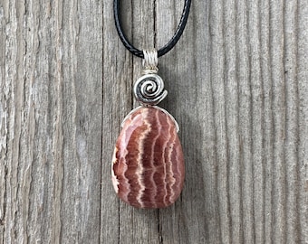 Rhodochrosite for Positivity and Love. Swirl Signifies Consciousness