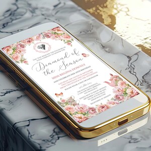 gold mobile with diamond of the season birthday invitation on face