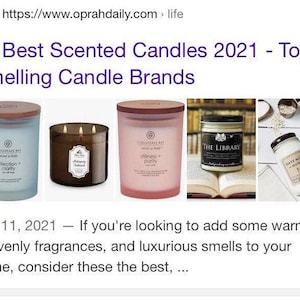 May include: Image features a selection of scented candles with wooden lids. The candles are in glass jars with labels, including "Reflection + Clarity," "Mahogany Teakwood," "Stillness + Purity," "The Library," and "Oats Milk + Honey." The image is from Oprah Daily.