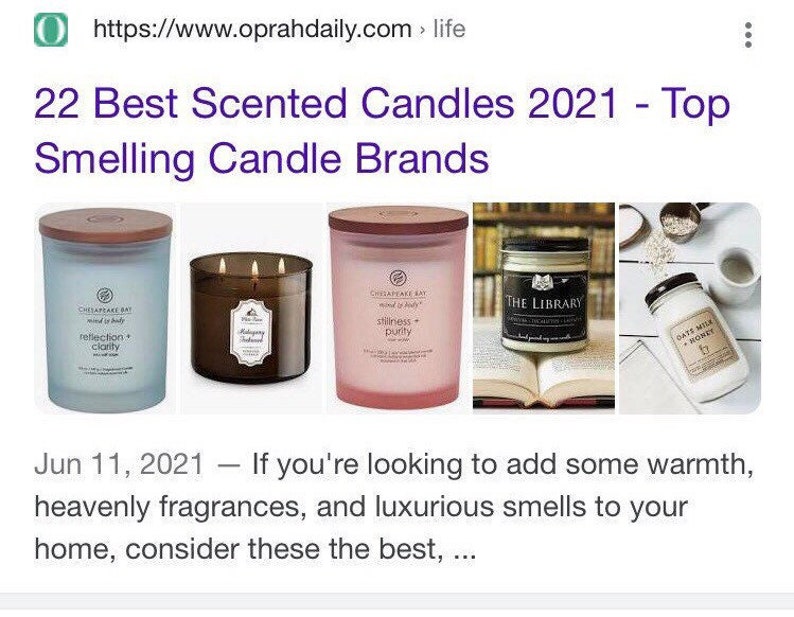 May include: Image features a selection of scented candles with wooden lids. The candles are in glass jars with labels, including "Reflection + Clarity," "Mahogany Teakwood," "Stillness + Purity," "The Library," and "Oats Milk + Honey." The image is from Oprah Daily.