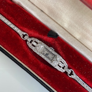 Antique 1930's Art Deco Cocktail Watch in Platinum with Marquise and Emerald Cut Diamonds