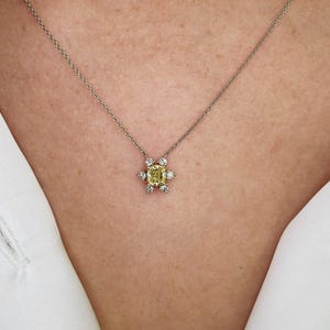 Starburst Necklace 0.51 CT Fancy Yellow & 0.12 CTW white Diamond set in 18 KWG