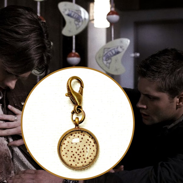 Supernatural Bad Sign Charm (bronze) made from a RARE Sam Winchester Screen Accurate Born Under a Bad Sign shirt.