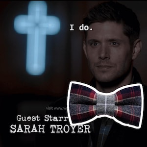 May include: A plaid bow tie with red, navy, and gray patterns. The image includes the text "I do." and the name "Sarah Troyer". A blue cross is in the background.