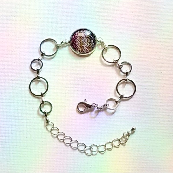 Supernatural DATE WITH a HALO bracelet, silver-tone. Made from Screen Accurate Dean Winchester Bi Pride plaid. Fits up to 8.25"