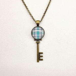 Supernatural NECKLACE made from a Supernatural Sam Winchester FRENCH MISTAKE Screen Accurate shirt. Cross on Bronze.