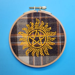 Sale HALLOWEEN SPN ART, "Equally Pretty," hand made out of neon Orange U V rhinestones. On Dean Winchester Screen accurate fabric, 5" hoop.