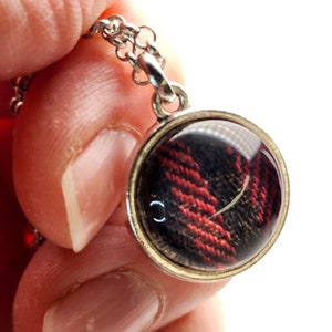 SUPERNATURAL petite BABY doublesided necklace made from screen accurate Sam and Dean Winchester Shirts. Striped cut. Silver toned.