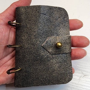 Supernatural Winchester Journal / notebook size SMOL (3 x 4) made from alt Dean Winchester jacket. Distressed black & tan. White paper.