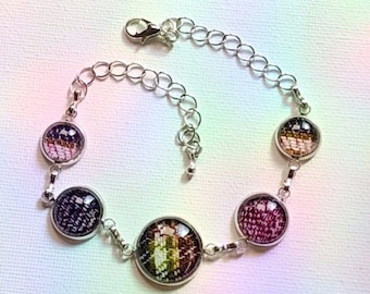 Supernatural DATE NIGHT BRACELET, silver-tone. Made from Screen Accurate Dean Winchester Bi Pride plaid. Fits up to 9.25"