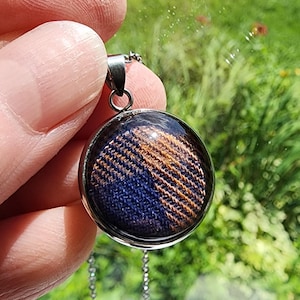 Supernatural Dean Winchester Executioner's Song Stainless necklace made from a RARE screen accurate shirt. 8.25", snap closure.