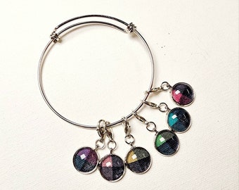 Supernatural Charlie Bradbury Charm Bracelet made from a Charlie Slumber Party Screen Accurate shirt.