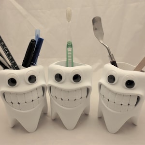 Hilarious Gag Gift Tooth with teeth Toothbrush or Pencil holder cup, Creepy Smile Googly Eyes, Funny White Elephant Gift for Dentist