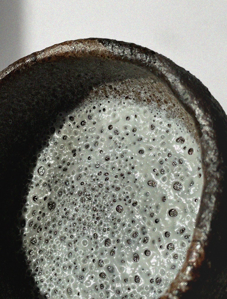 Small earthy hand pinched Stoneware Bowl with Crater Surface from Shino Glaze Wabi Sabi Nature in Brown Pottery