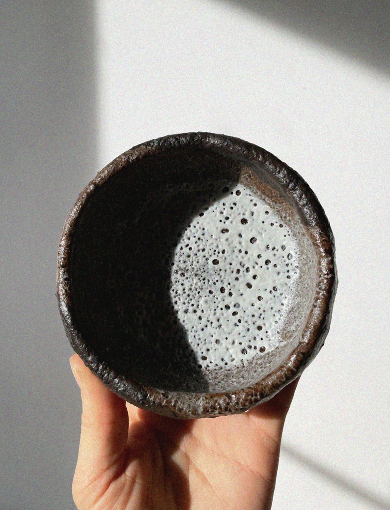 Small earthy hand pinched Stoneware Bowl with Crater Surface from Shino Glaze Wabi Sabi Nature in Brown Pottery