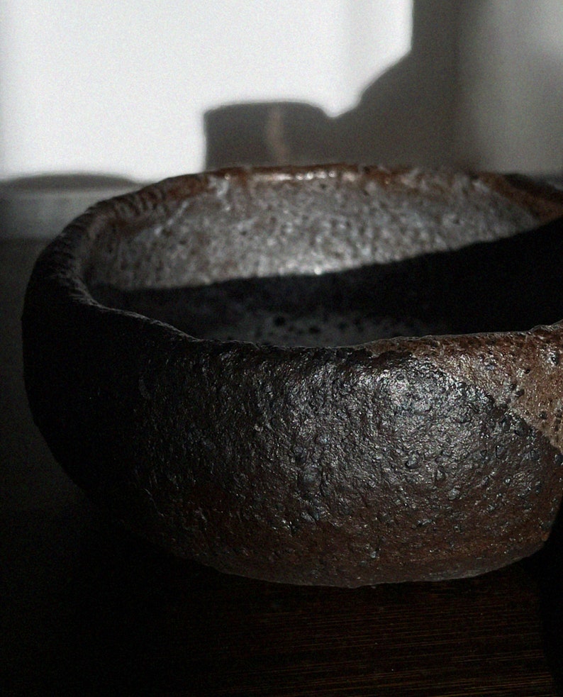 Small earthy hand pinched Stoneware Bowl with Crater Surface from Shino Glaze Wabi Sabi Nature in Brown Pottery