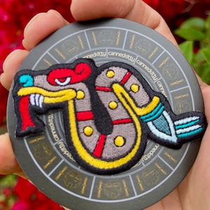 Coatl Iron On Patch + Sticker