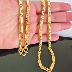 24K金製ベイビープレスレットと24K金製ペンダント 鈴付き Thai gold