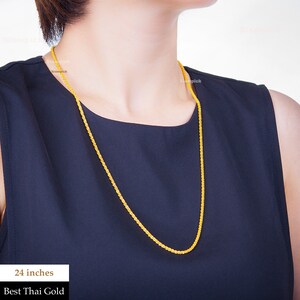 May include: A 24-inch gold chain necklace. Best Thai Gold.