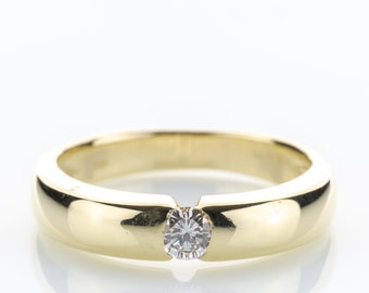 14k gold ring with a diamond