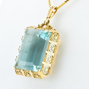 Vintage pendant 585 gold with a 100ct aquamarine