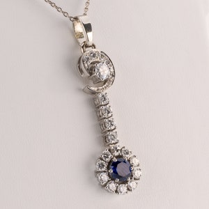 Vintage pendant 18k gold with a sapphire and diamonds