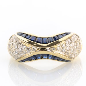 Ladies ring 18k gold with sapphires and diamonds