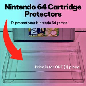 May include: Clear plastic Nintendo 64 cartridge protector. The image shows a clear plastic case designed to protect Nintendo 64 game cartridges. Text on the image reads "Nintendo 64 Cartridge Protectors" and "To protect your Nintendo 64 games."
