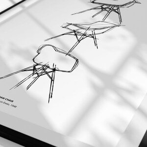 May include: A black and white line drawing of three Eames DAW chairs. The drawing is on a white background and includes the text "DAW CHAIR Ray & Charles Eames, 1948".