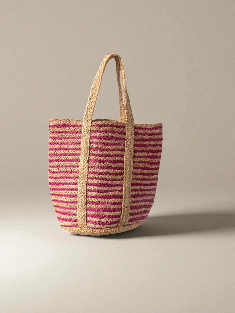 Handmade woven straw handbag with pink and beige stripes