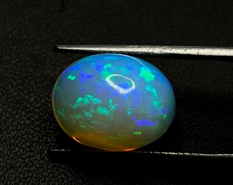 100% Natural Blue Fire Ethiopian Opal Gemstone Oval Shape  Cabochon AAA Quality Loose Gemstone Size  (12x15.50x9.50 mm) Weight 8.40 Carats