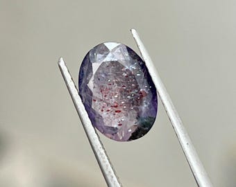 100 % naturlig blodsprängd iolit-solsten: oval formad fasetterad lös ädelsten, 2 ct storlek 8 x 11 mm