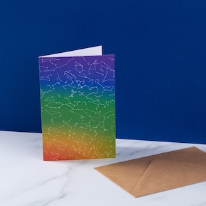 Carte de voeux constellations arc-en-ciel