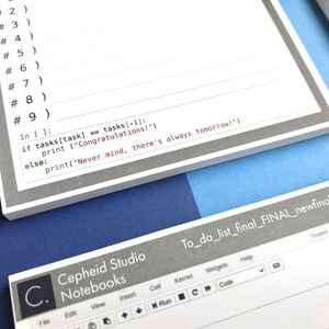 May include: A white notebook with gray lines and a gray border. The notebook has a section for numbered tasks and a section for code. The code is written in Python and includes the text "Congratulations!" and "Never mind, there's always tomorrow!"