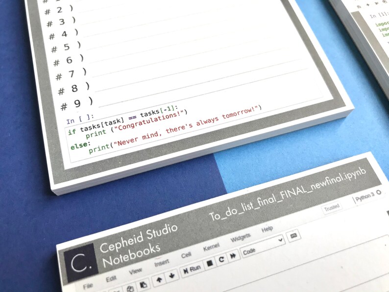 May include: A white notebook with gray lines and a gray border. The notebook has a section for numbered tasks and a section for code. The code is written in Python and includes the text "Congratulations!" and "Never mind, there's always tomorrow!"