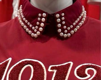 Collar de perlas carmesí