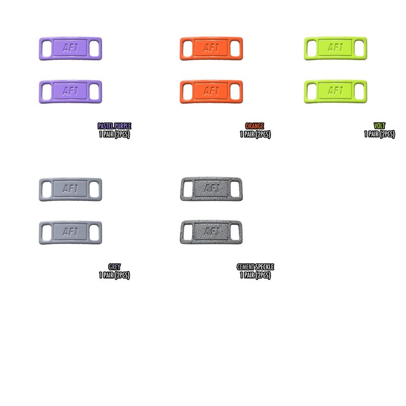 May include: A collection of shoe tag accessories in various colors, including pastel purple, orange, volt, grey, and cement speckle. Each tag features the text "AFT" and is sold in pairs.