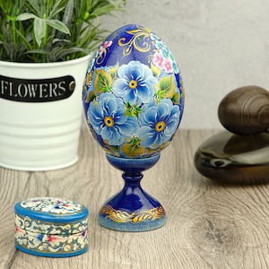 Ukrainian Easter egg |Handmade painting egg in blue flowers |Wooden painted egg on stand |Sky blue flowers on Easter egg| Ukrainian pysanka