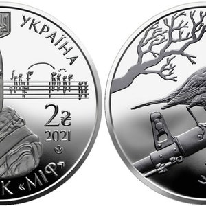 May include: A silver commemorative coin with a portrait of Vasyl Slipak, a Ukrainian opera singer, on one side and a bird perched on a rifle barrel on the other side. The coin is inscribed with "UKRAINE" and "2₴ 2021".