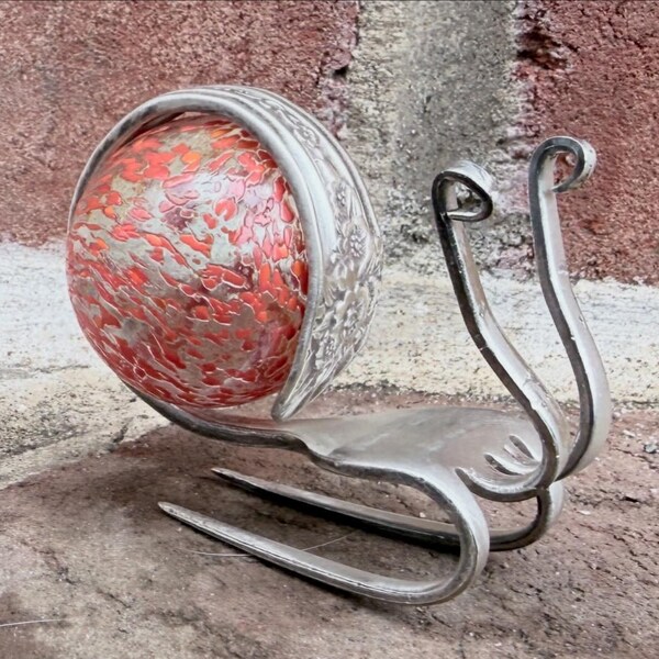 Orange Glass Marble and Silverplated Fork Snail