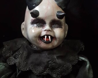 vampire baby doll with moving eyes for sale