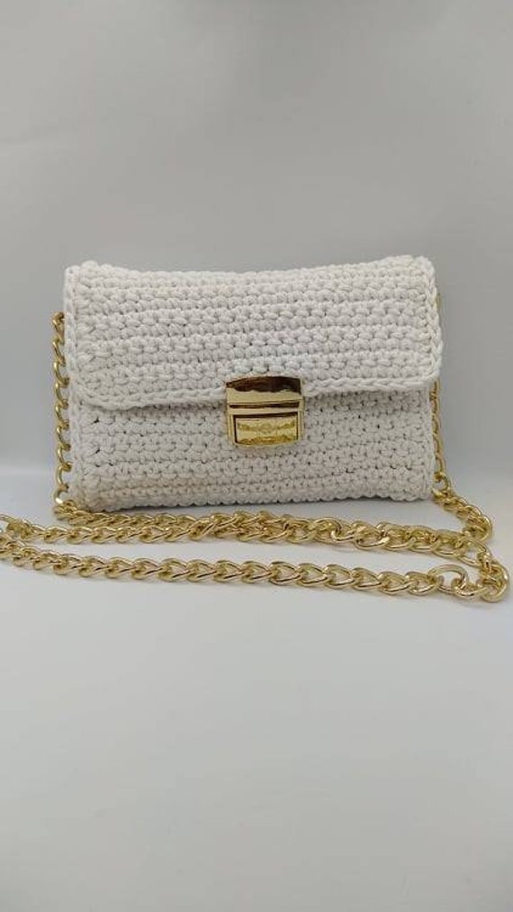 white shoulder clutch bag