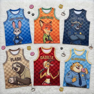 May include: Six colorful Zootopia-themed basketball jerseys. Each jersey features a character: Judy Hopps, Nick Wilde, Chief Bogo, Flash, Gazelle, and Clawhauser. The jerseys have character names printed at the top and are decorated with donuts, paw prints, and coffee cups.