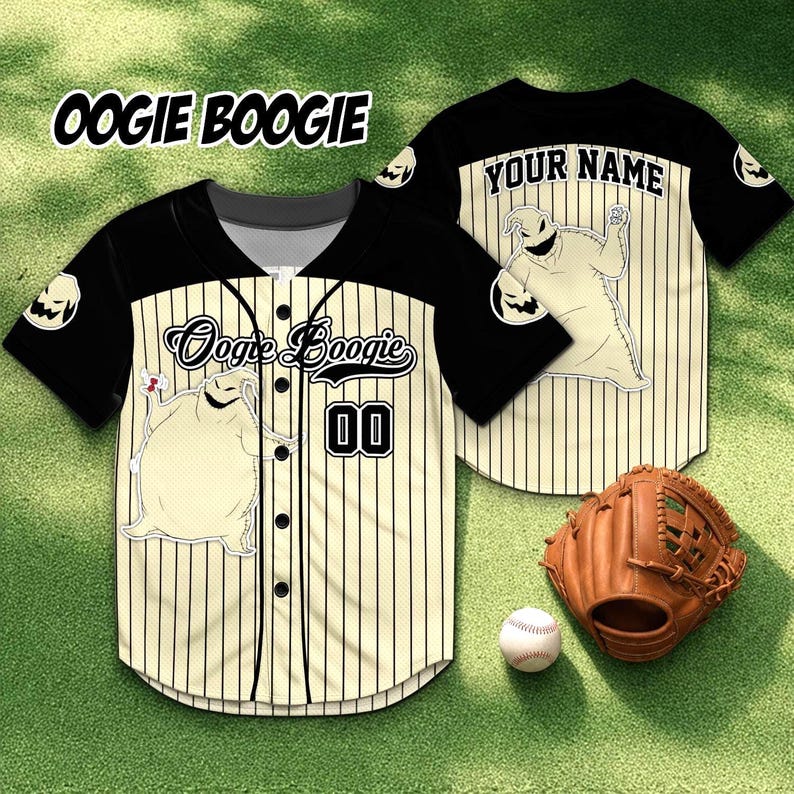 May include: Baseball jersey with a cream and black color scheme, featuring the text "Oogie Boogie" and a cartoon character graphic. The jersey has vertical stripes, the number "00", and a baseball glove and ball are also visible.
