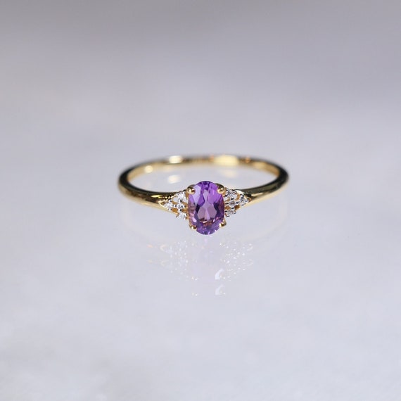 14k Yellow Gold 6x4mm Oval Amethyst and AA Diamond Heart Knot Side Ring 14k Yellow Gold 6x4mm Oval Amethyst and AA Diamond Heart Knot Side Ring