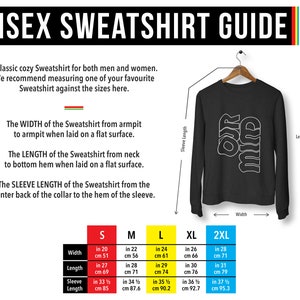 Pode incluir: Guia de tamanhos de moletom unissex com medidas em polegadas e cent&iacute;metros para os tamanhos S, M, L, XL e 2XL. O guia mostra a largura, o comprimento e o comprimento da manga do moletom.