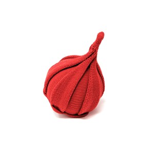 May include: A red knitted hat with a pointed top, folded into a rounded shape.