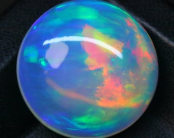 Cabujón de ópalo de fuego etíope AAA: piedra preciosa redonda de 29,10 quilates