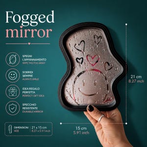 Könnte beinhalten: Beschlagener Spiegel mit schwarzem Rahmen, verziert mit einem Smiley und Herzen. Der Spiegel misst 21 x 15 cm und trägt den Text "Fogged mirror". Abmessungen: 21 cm x 15 cm.