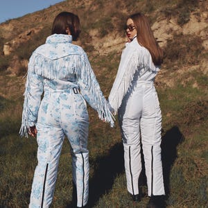 Traje de esquí blanco con flecos, traje de nieve de una pieza, traje de nieve blanco para mujer para deportes de invierno con borlas, mono cálido de invierno, traje de esquí y nieve. imagen 12